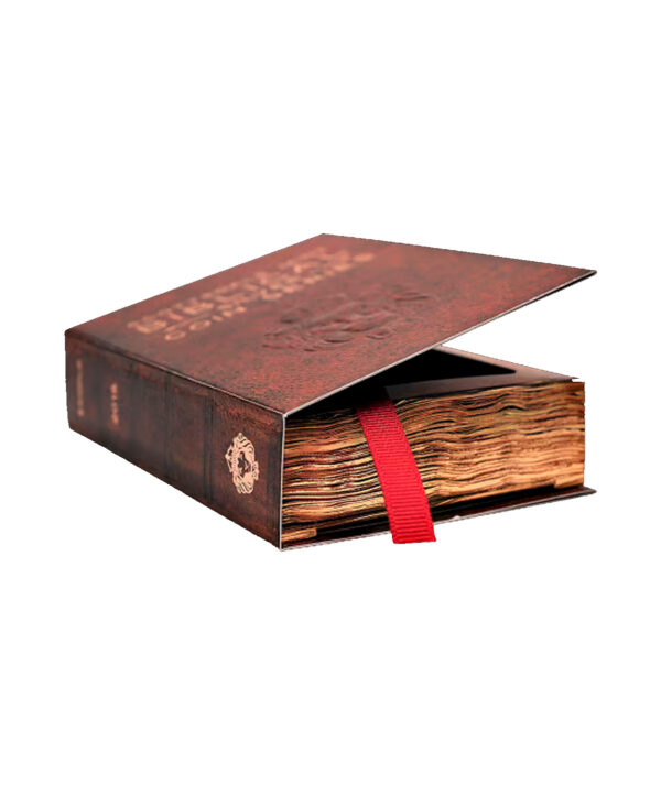Caja de la moneda Daniel en el Foso de los Leones, con la forma y el diseño de una Biblia del siglo XIX