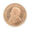 Perspectiva frontal de la cara de la moneda de oro Krugerrand 1 oz de 1977, con el rostro de Paul Kruger