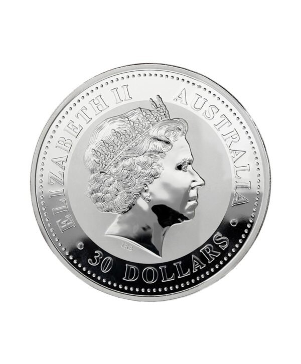 cara-moneda-plata-kookaburra-1kg-1999 Perspectiva frontal de la cara de la moneda de plata Kookaburra de 1kg de 1999, que muestra al rostro de la monarca Isabel II