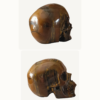Pareja de Calaveras talladas en Ojo de Tigre lado_ GoldenArt Pareja de Calaveras talladas en Ojo de Tigre lado_ GoldenArt